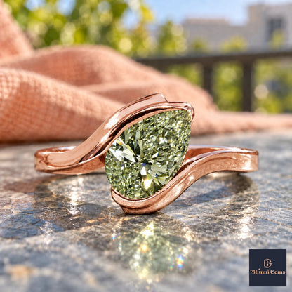 Green Pear Cut Lab Grown Diamond Engagement Ring - Wrap Bypass Solitaire in rose gold, close-up