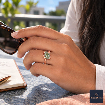 Green Pear Cut Lab Grown Diamond Engagement Ring - Wrap Bypass Solitaire in rose gold, worn on the hand