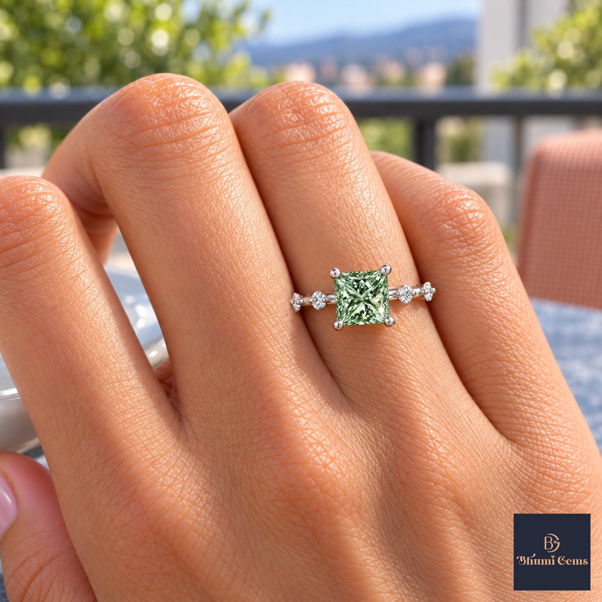 Green Princess Cut Lab Grown Diamond Engagement Ring - Station Band in white gold, on the hand