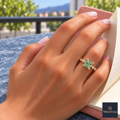 Green Princess Cut Lab Grown Diamond Engagement Ring - Station Band in yellow gold, on the hand