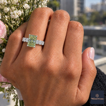 Green Radiant Cut Lab Grown Diamond Engagement Ring - Shared Prong Band in white gold, worn on the hand