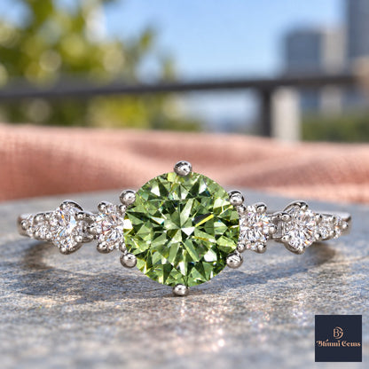 Green Round Cut Lab Grown Diamond Engagement Ring - Cluster Shoulders in white gold, close-up