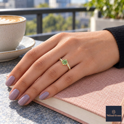 Green Round Cut Lab Grown Diamond Engagement Ring - Pave Twist Bypass in yellow gold, on the hand