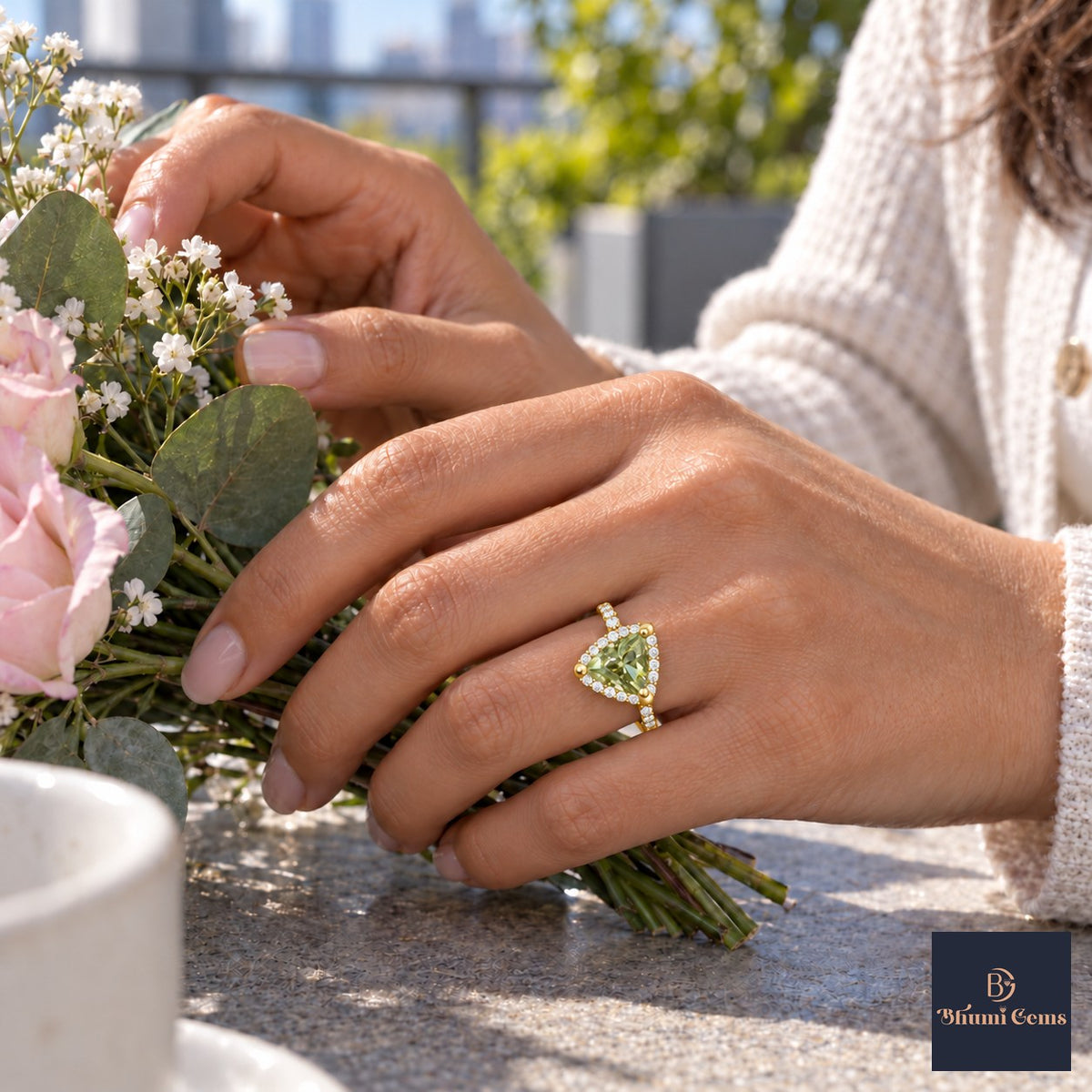 Green Trillion Cut Lab Grown Diamond Engagement Ring - Halo in yellow gold, worn on the hand