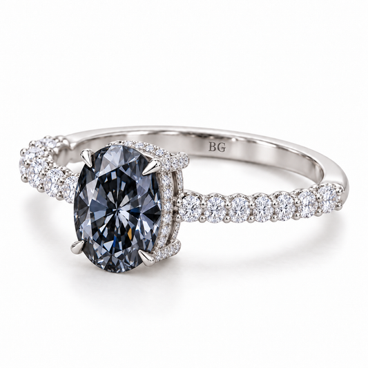 Oval grey moissanite engagement ring with pave band and hidden halo in white gold