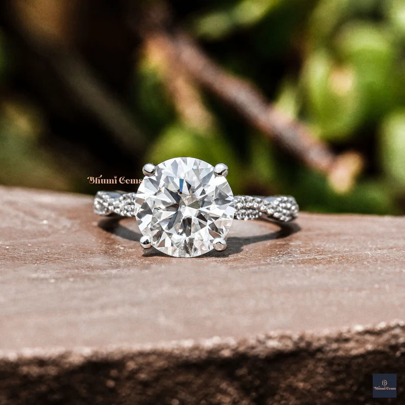 Round Moissanite Infinity Solitaire Ring