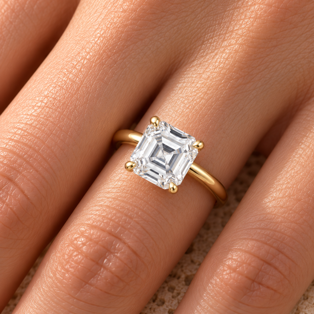 Asscher cut lab grown diamond plain band solitaire worn on hand, yellow gold