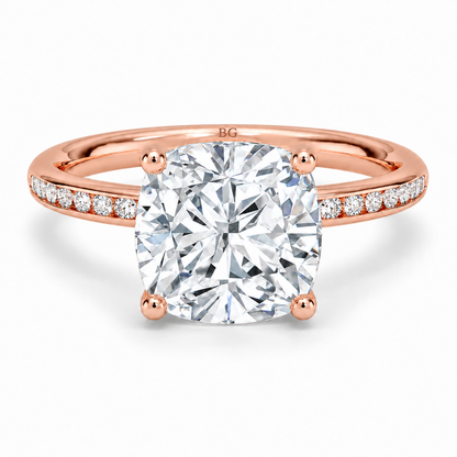 Cushion cut lab grown diamond solitaire ring with channel set band in rose gold