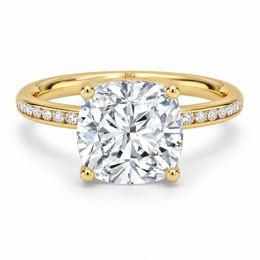 Cushion cut lab grown diamond solitaire ring with channel set band in yellow gold
