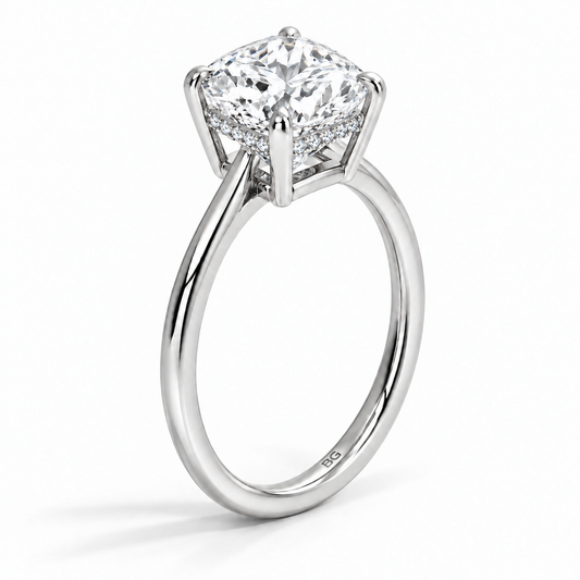 Cushion cut lab grown diamond hidden halo engagement ring with thin plain band in white gold