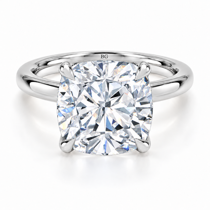 Cushion cut lab grown diamond solitaire ring with plain band in white gold