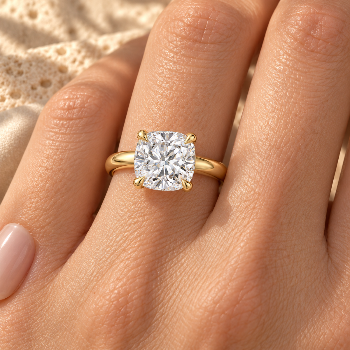 Cushion lab grown diamond plain band solitaire worn on hand, yellow gold