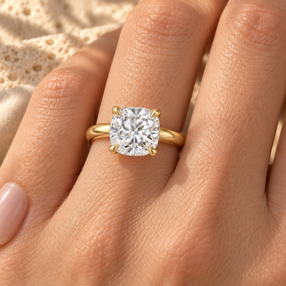 Cushion lab grown diamond plain band solitaire worn on hand, yellow gold