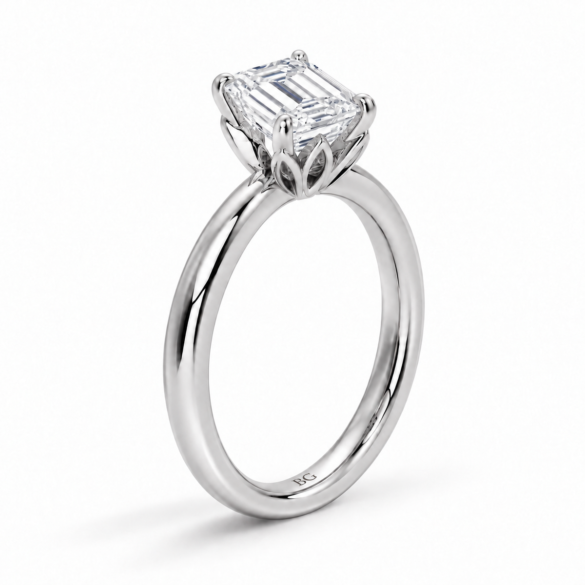 Emerald cut lab grown diamond solitaire engagement ring with lotus basket and plain band in white gold
