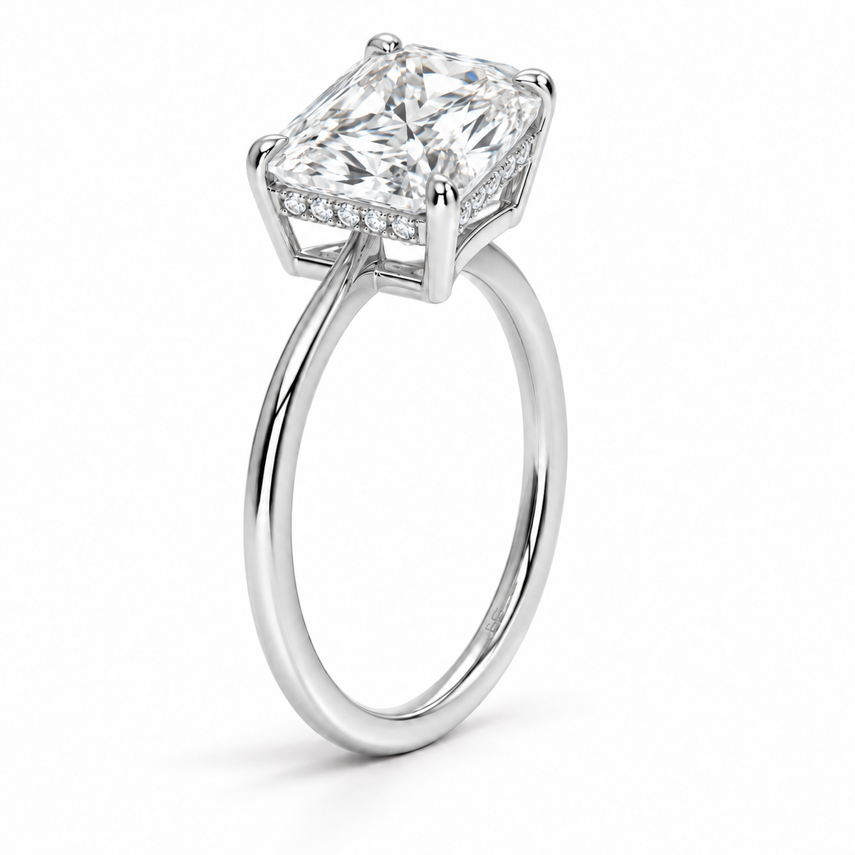 Radiant cut lab grown diamond hidden halo engagement ring with thin plain band in white gold