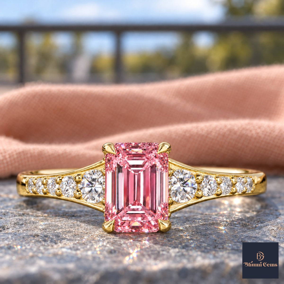 Pink Emerald Cut Lab Grown Diamond Engagement Ring - Graduated Pave Shoulders in yellow gold, close-up