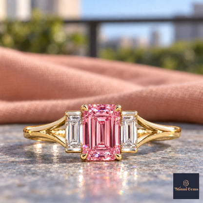 Pink Emerald Cut Lab Grown Diamond Engagement Ring - Trapezoid Three Stone in yellow gold, close-up