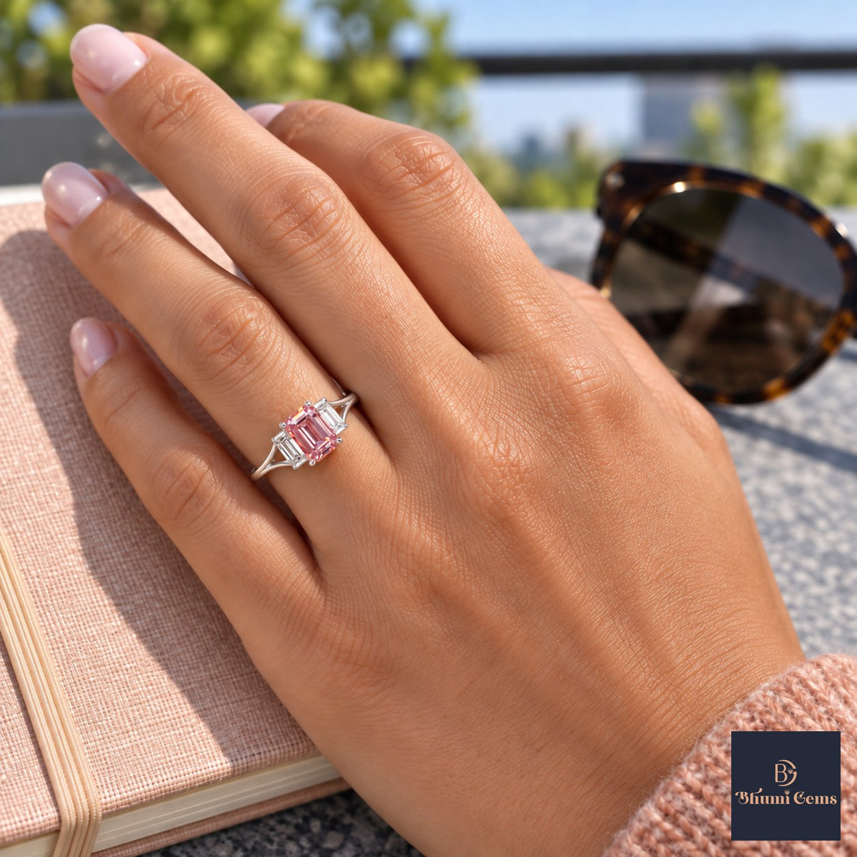 Pink Emerald Cut Lab Grown Diamond Engagement Ring - Trapezoid Three Stone in white gold, worn on the hand
