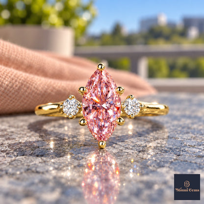 Pink Marquise Cut Lab Grown Diamond Engagement Ring - Three Stone in yellow gold, close-up