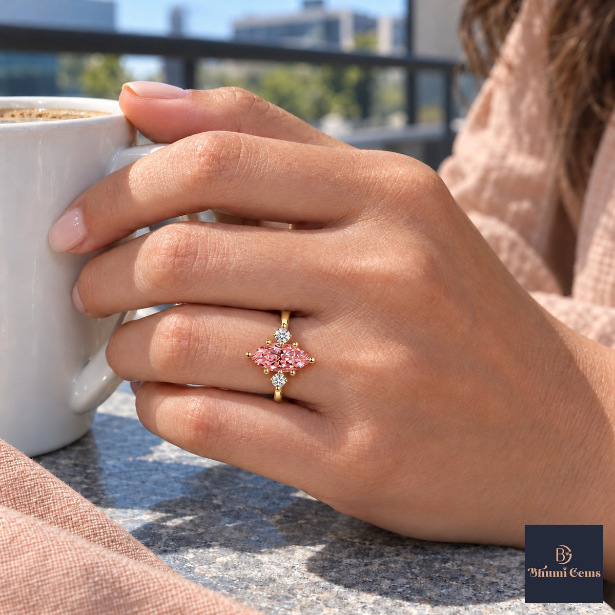 Pink Marquise Cut Lab Grown Diamond Engagement Ring - Three Stone in yellow gold, worn on the hand