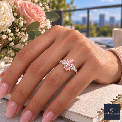 Pink Oval Cut Lab Grown Diamond Engagement Ring - Half Moon Pave in rose gold, worn on the hand