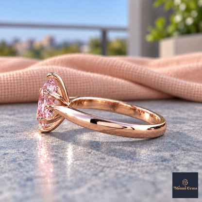 Pink Oval Cut Lab Grown Diamond Engagement Ring - Heart Prong Solitaire in rose gold, side view