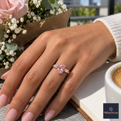 Pink Oval Cut Lab Grown Diamond Engagement Ring - Leaf Bypass in rose gold, worn on the hand