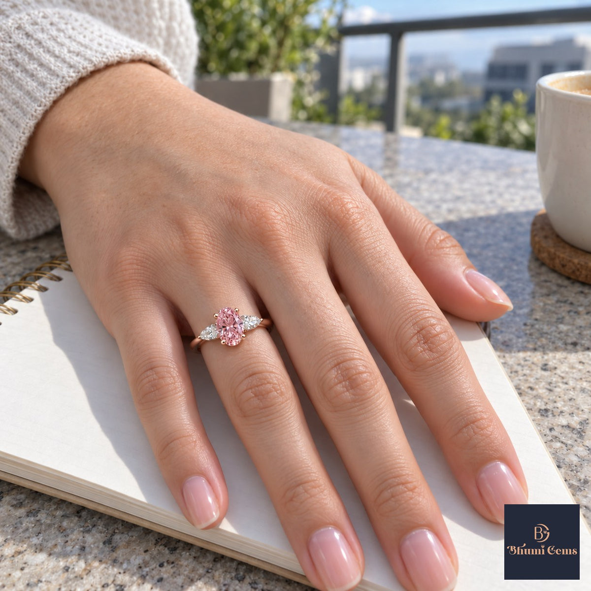 Pink Oval Cut Lab Grown Diamond Engagement Ring - Pear Side Stones in rose gold, worn on the hand
