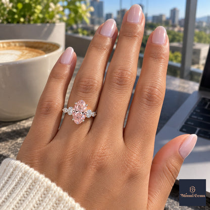 Pink Oval Cut Lab Grown Diamond Engagement Ring - Round and Marquise Accents in white gold, on the hand