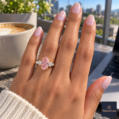 Pink Oval Cut Lab Grown Diamond Engagement Ring - Round and Marquise Accents in yellow gold, on the hand