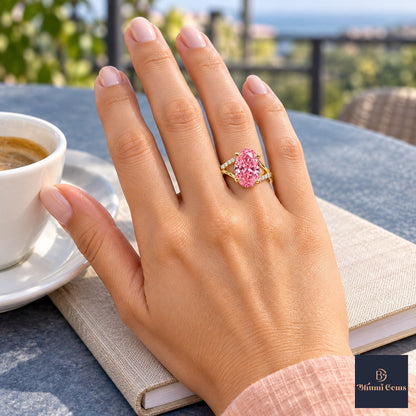 Pink Oval Cut Lab Grown Diamond Engagement Ring - Split Pave Shoulders in yellow gold, on the hand