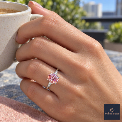 Pink Oval Cut Lab Grown Diamond Engagement Ring - Tapered Baguettes in white gold, on the hand