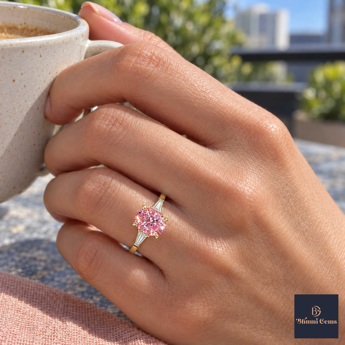 Pink Oval Cut Lab Grown Diamond Engagement Ring - Tapered Baguettes in yellow gold, on the hand