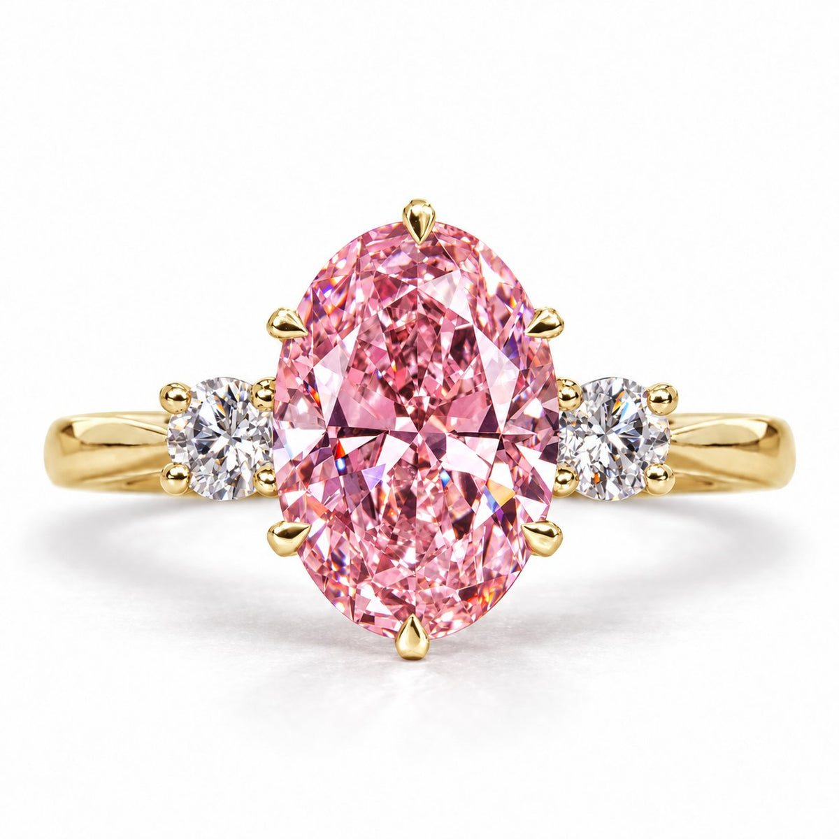 Pink Oval Cut Lab Grown Diamond Engagement Ring - Three Stone in yellow gold, front view
