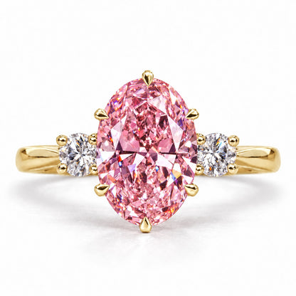 Pink Oval Cut Lab Grown Diamond Engagement Ring - Three Stone in yellow gold, front view