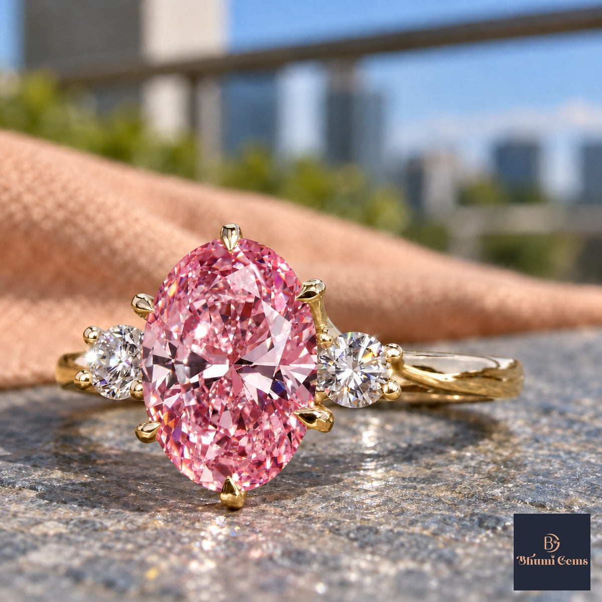 Pink Oval Cut Lab Grown Diamond Engagement Ring - Three Stone in yellow gold, close-up