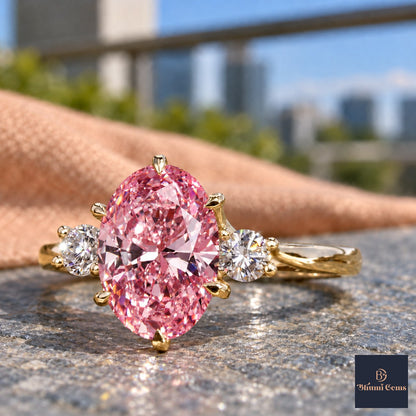 Pink Oval Cut Lab Grown Diamond Engagement Ring - Three Stone in yellow gold, close-up