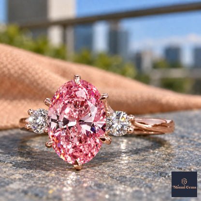 Pink Oval Cut Lab Grown Diamond Engagement Ring - Three Stone in rose gold, close-up