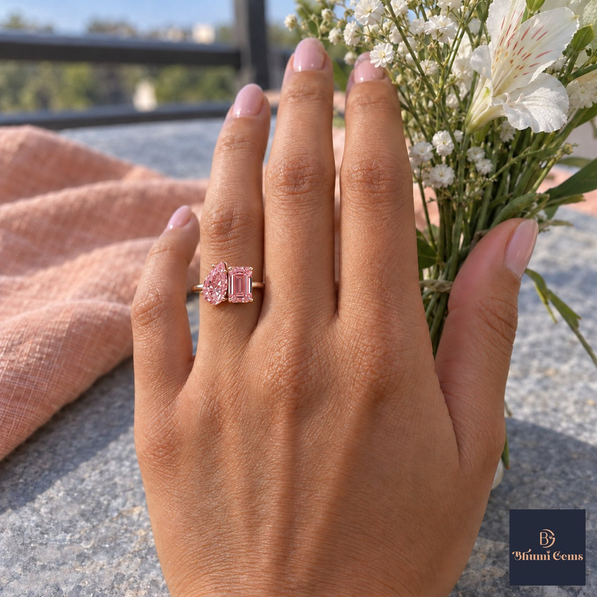 Pink Pear and Emerald Cut Lab Grown Diamond Engagement Ring - Toi et Moi in rose gold, worn on the hand