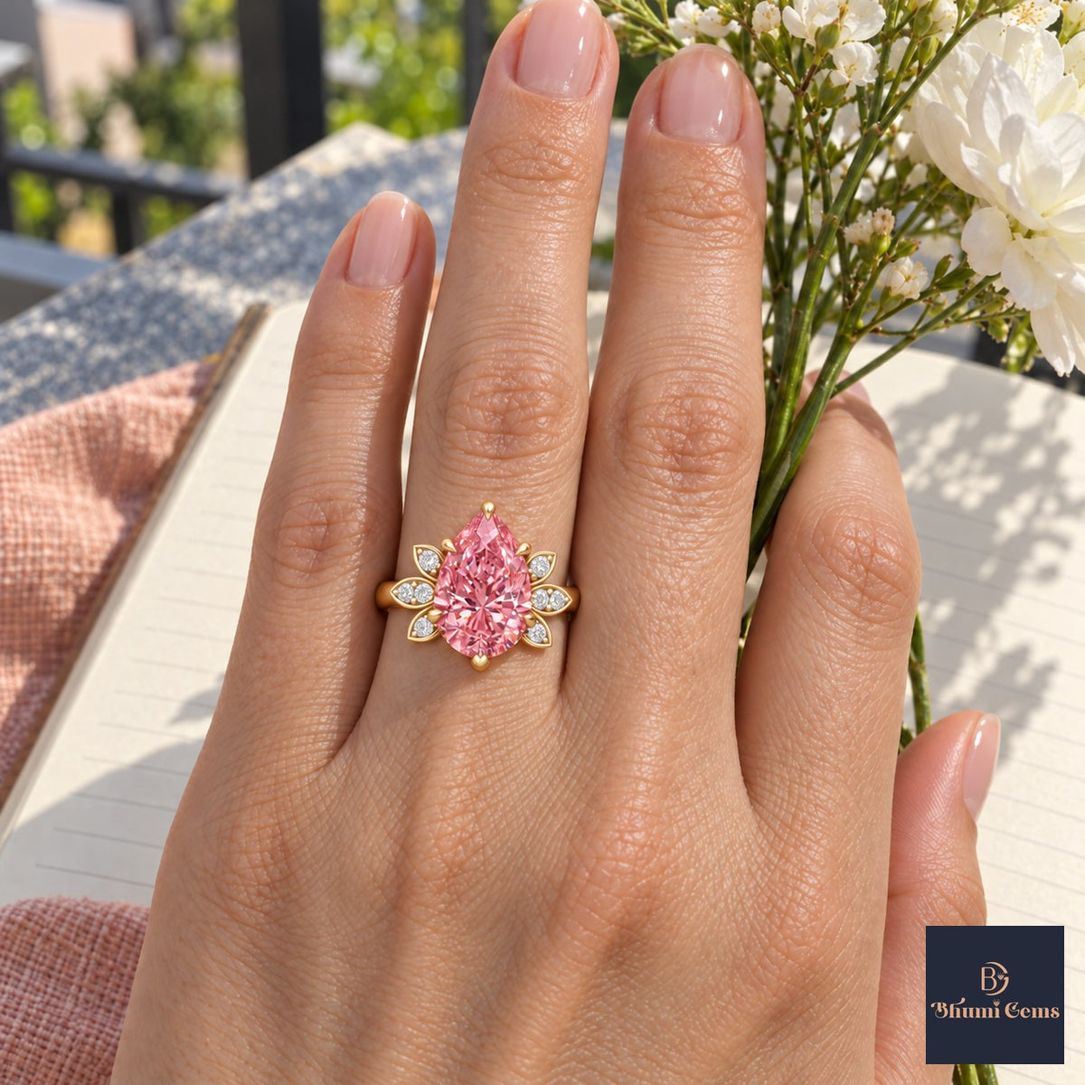 Pink Pear Cut Lab Grown Diamond Engagement Ring - Floral Leaf Accents in yellow gold, worn on the hand