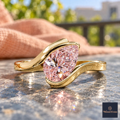 Pink Pear Cut Lab Grown Diamond Engagement Ring - Wrap Bypass Solitaire in yellow gold, close-up
