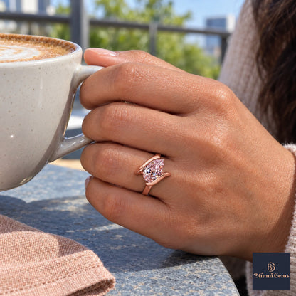 Pink Pear Cut Lab Grown Diamond Engagement Ring - Wrap Bypass Solitaire in rose gold, on the hand
