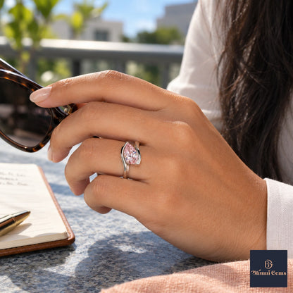 Pink Pear Cut Lab Grown Diamond Engagement Ring - Wrap Bypass Solitaire in white gold, worn on the hand