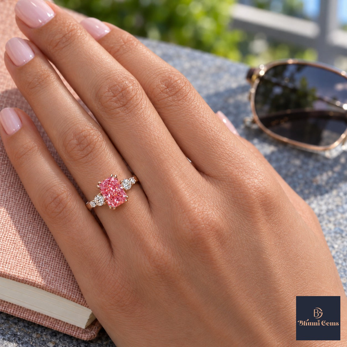 Pink Radiant Cut Lab Grown Diamond Engagement Ring - Round Accents in rose gold, worn on the hand