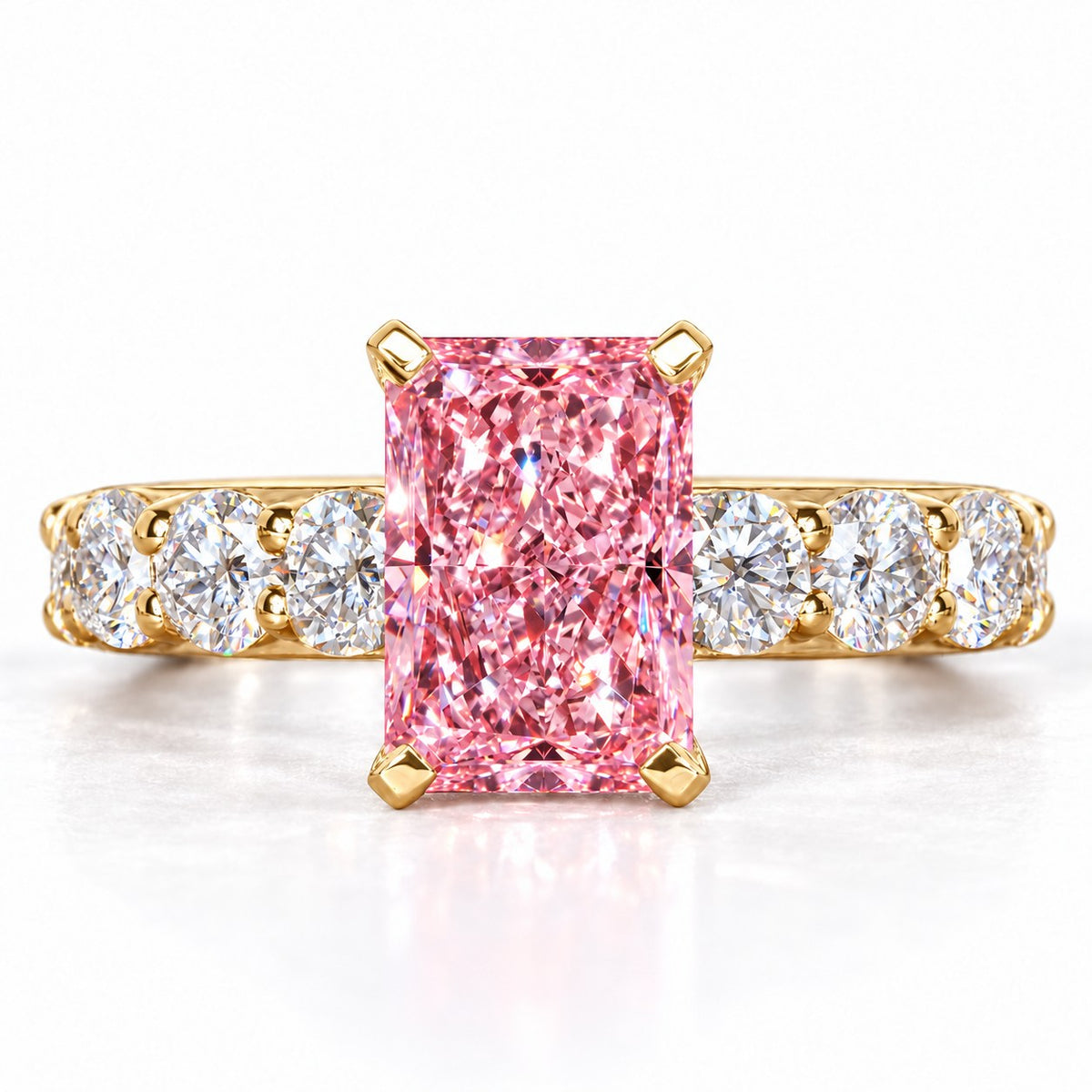 Pink Radiant Cut Lab Grown Diamond Engagement Ring - Shared Prong Band in yellow gold, front view