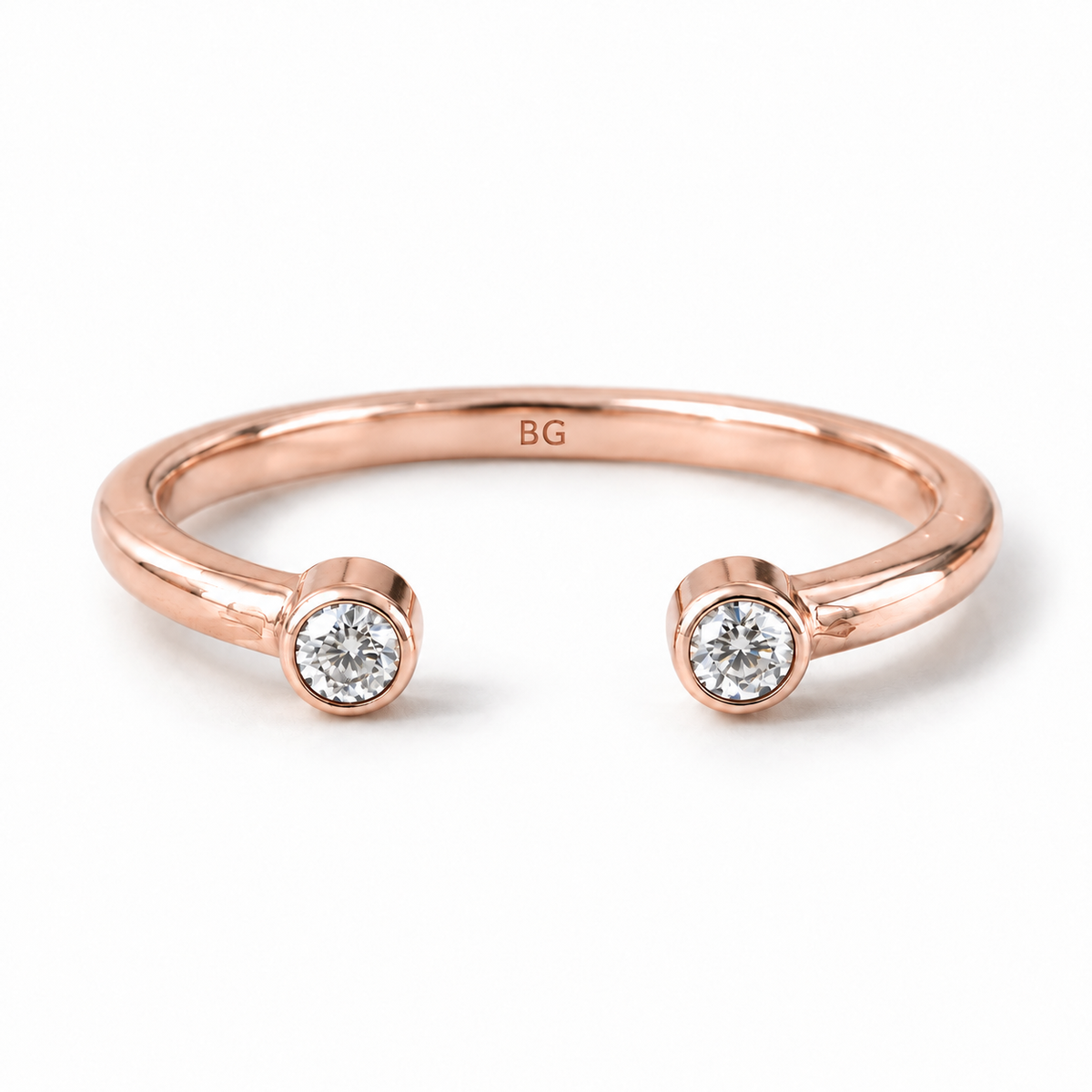 Round cut two stone moissanite open cuff band in rose gold