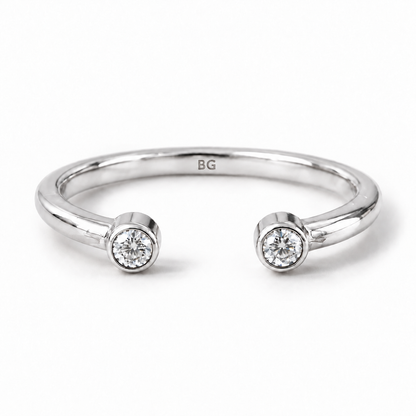 Round cut two stone moissanite open cuff band in white gold