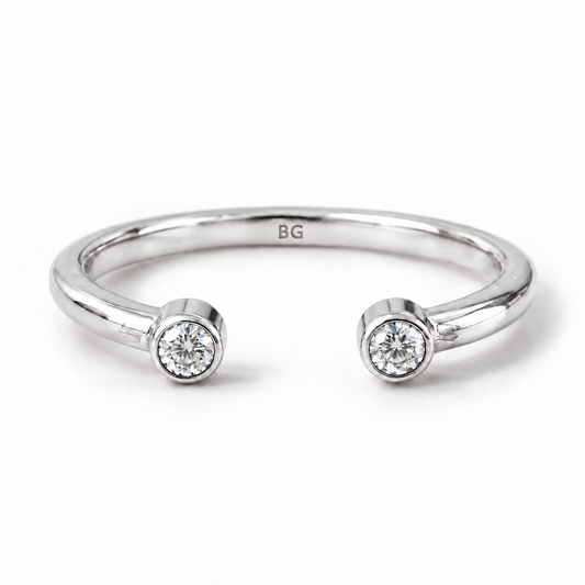 Round cut two stone moissanite open cuff band in white gold
