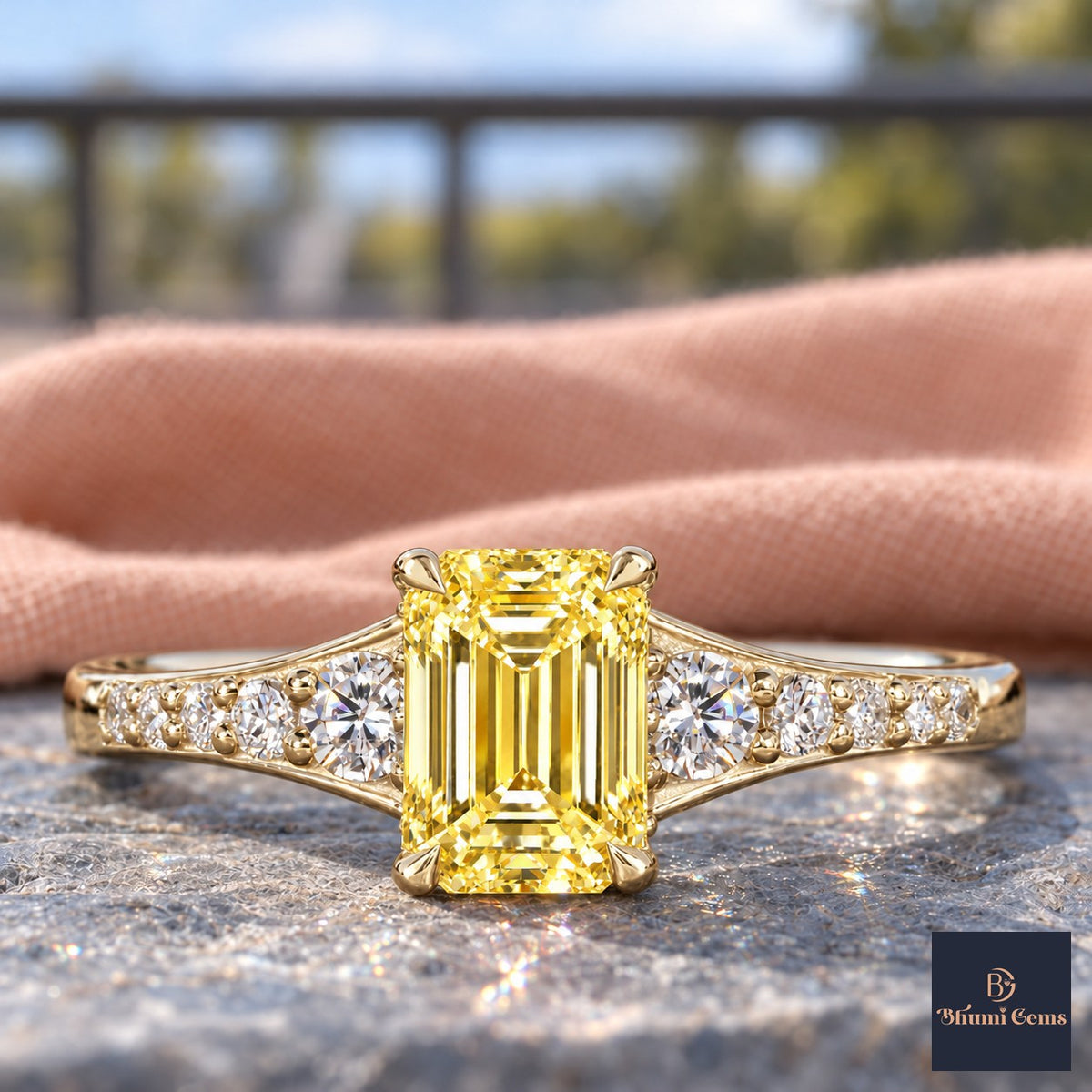 Yellow Emerald Cut Lab Grown Diamond Engagement Ring - Graduated Pave Shoulders in yellow gold, close-up