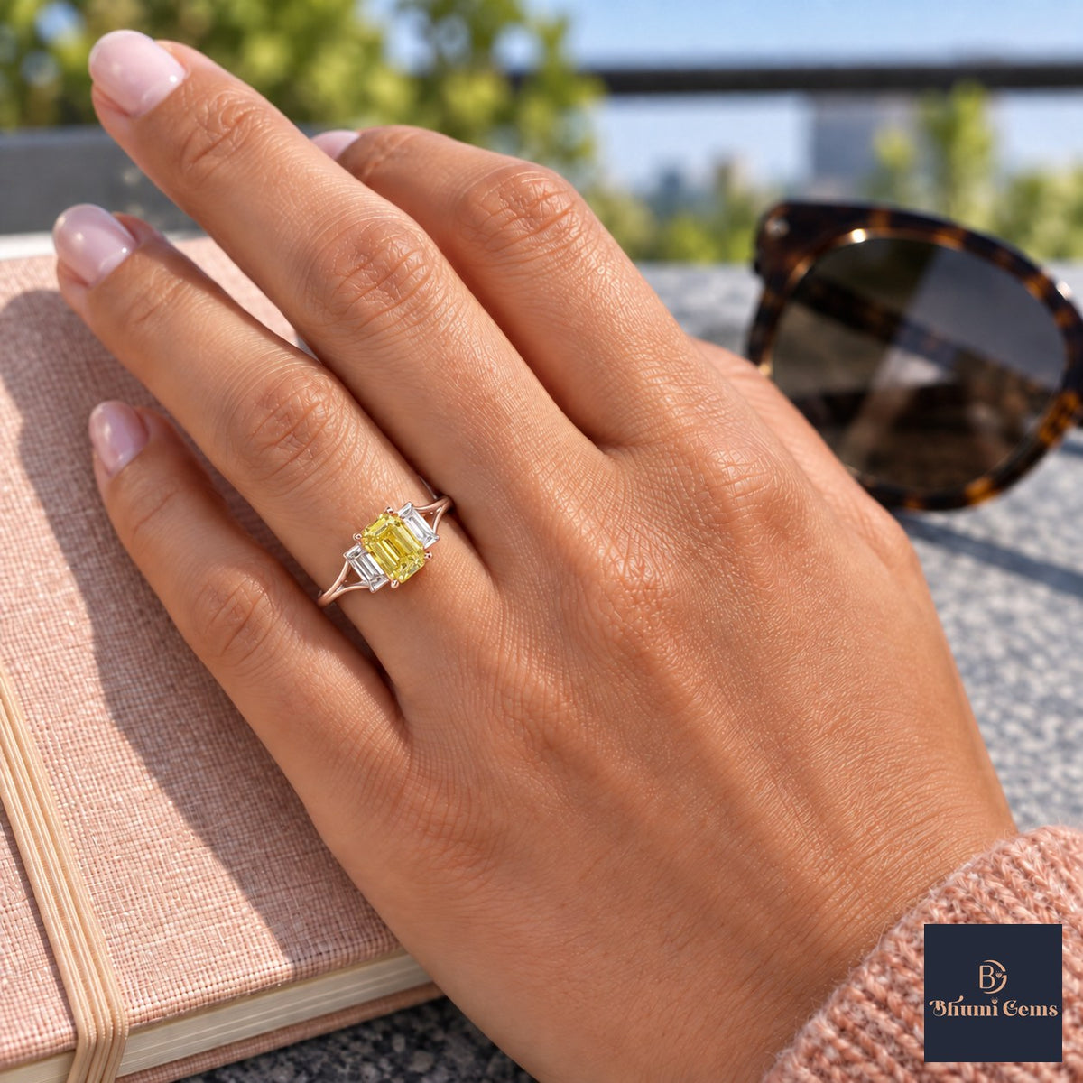 Yellow Emerald Cut Lab Grown Diamond Engagement Ring - Trapezoid Three Stone in rose gold, worn on the hand